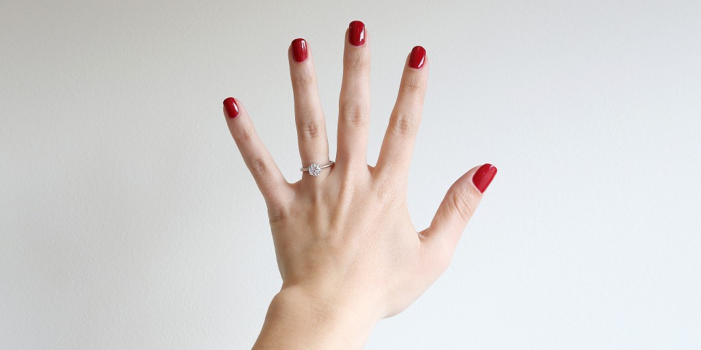 diamond ring on a hand