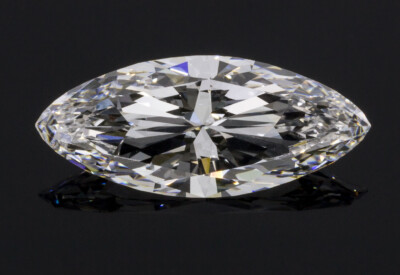 A close-up of a marquise-cut diamond