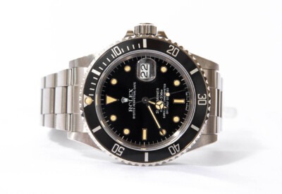 Rolex Submariner on a white background.