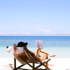 Woman-sitting-on-beach-chair