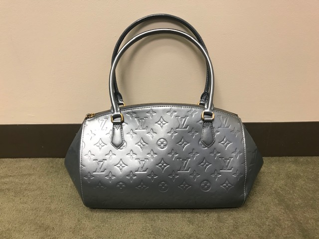 How to authenticate and spot a fake Louis Vuitton handbag