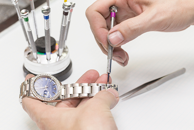 Jeweler Repairing Rolex