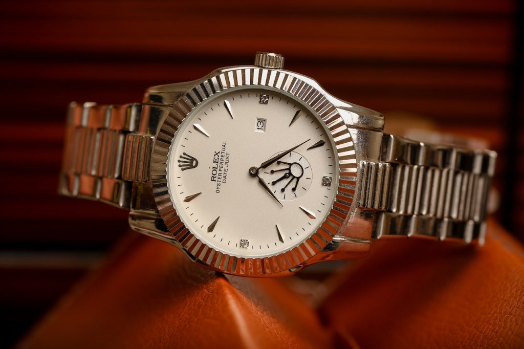 silver strape rolex watch
