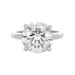 A stunning solitaire diamond ring with a round brilliant-cut diamond, set in a sleek white gold band.