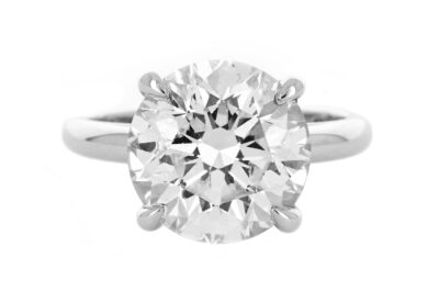 A stunning solitaire diamond ring with a round brilliant-cut diamond, set in a sleek white gold band.