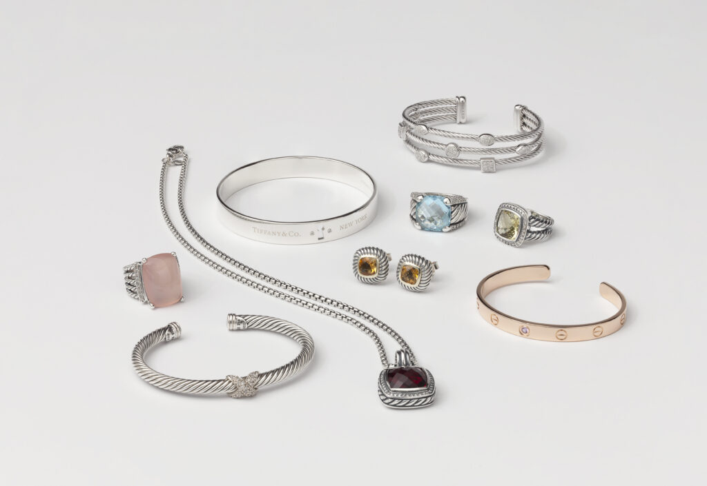 Assortment of jewelry on white surface