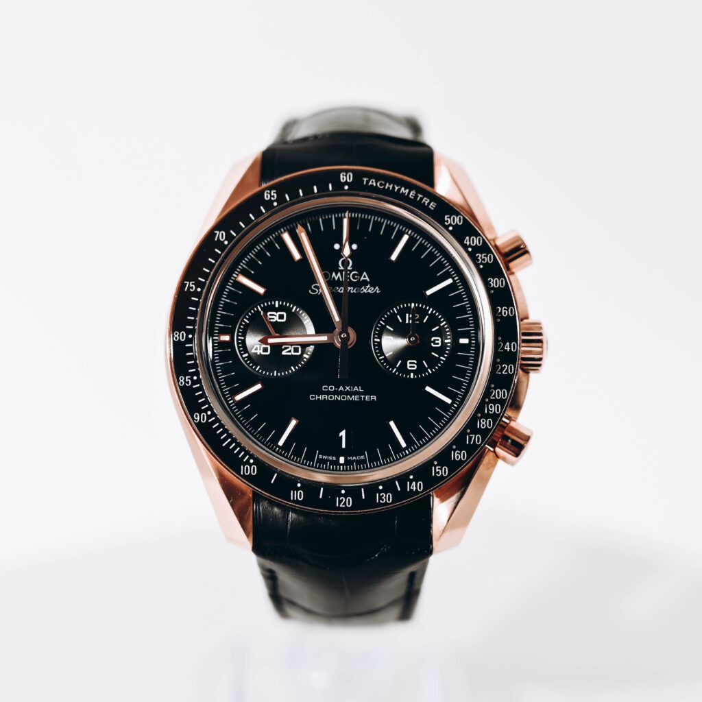 Omega Speedmaster Rose Gold Watch with black leather strap
