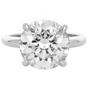 A stunning solitaire diamond ring with a round brilliant-cut diamond, set in a sleek white gold band.