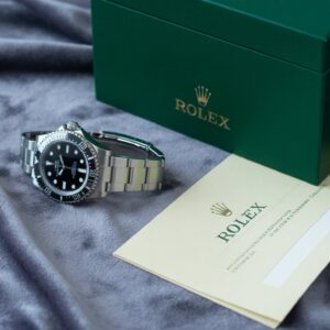 Rolex with box and paper