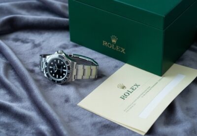 Rolex with box and paper