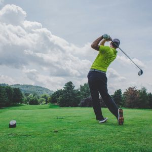 Golfer hitting a ball
