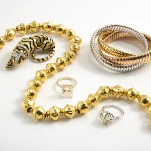 A Diamond Banc expert evaluating a fine jewelry piece during a secure, professional appraisal