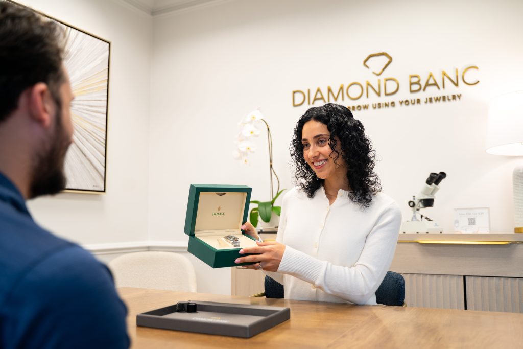 Jeanetta Bell with a client at Diamond Banc